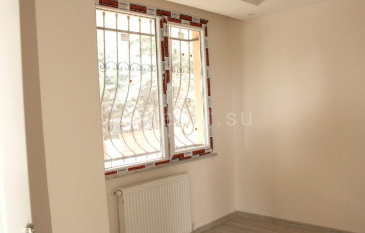 Недвижимость в Турции: двухкомнатная квартира в Бейликдюзю по доступной цене